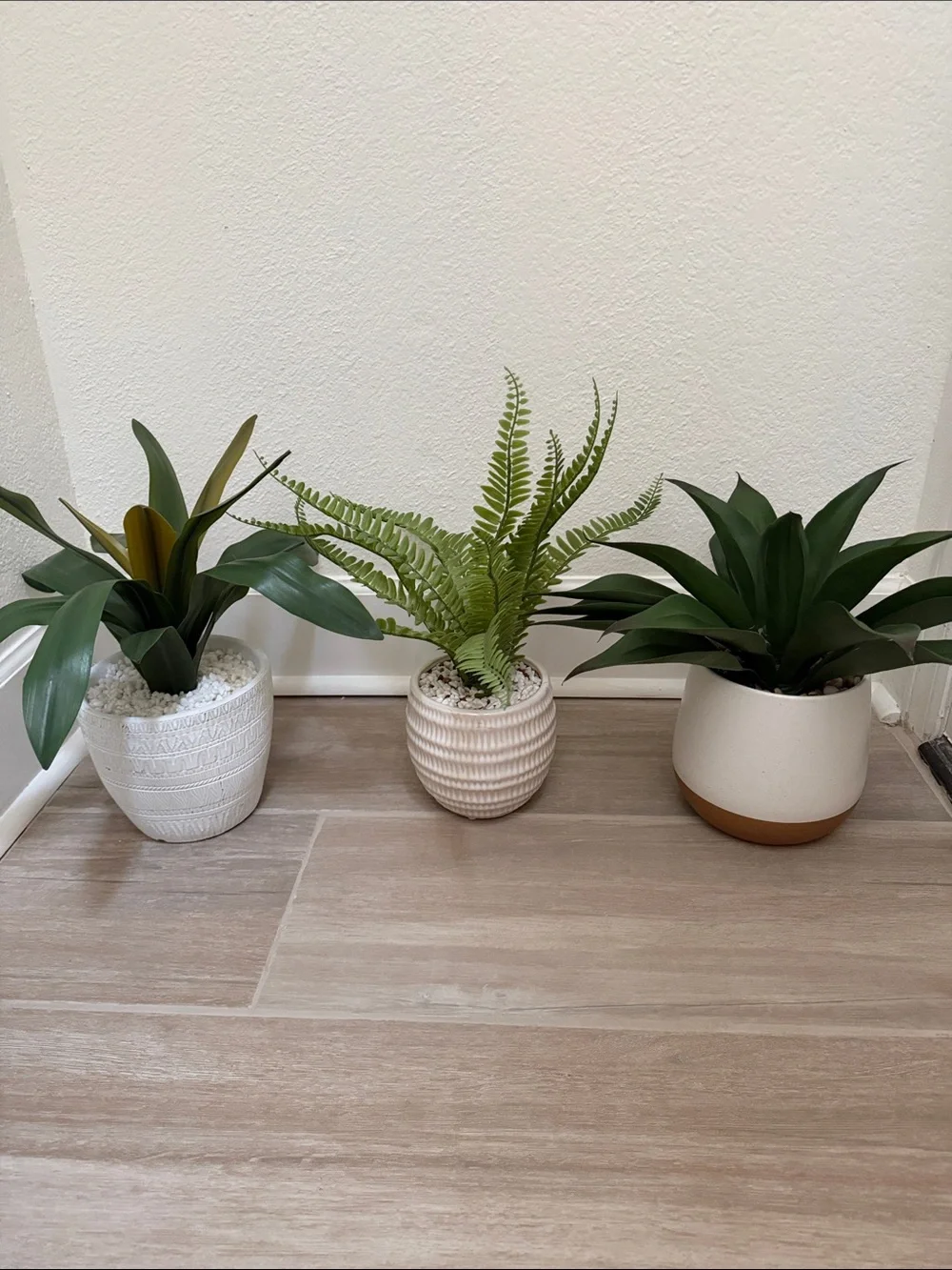 Decorative White Ceramic Ribbed Planter with Green Faux Fern